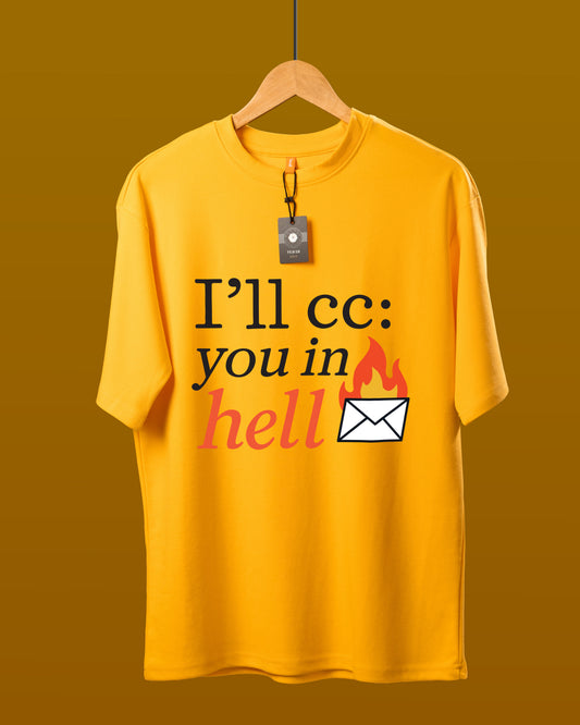 DUMM I'll CC You In Hell oversized t-shirt in mustard yellow on wooden hanger