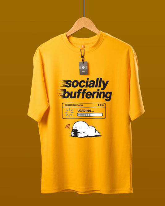 DUMM Socially Buffering oversized t-shirt in mustard yellow on wooden hanger