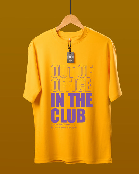 DUMM Out Of Office In The Club oversized t-shirt in mustard yellow on wooden hanger
