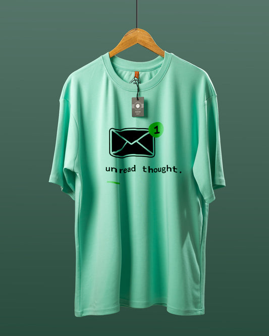 DUMM Unread Thought oversized t-shirt in mint green on wooden hanger