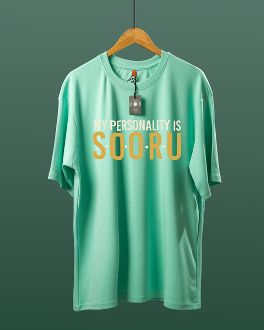 DUMM My Personality Is Sooru oversized t-shirt in mint green on wooden hanger
