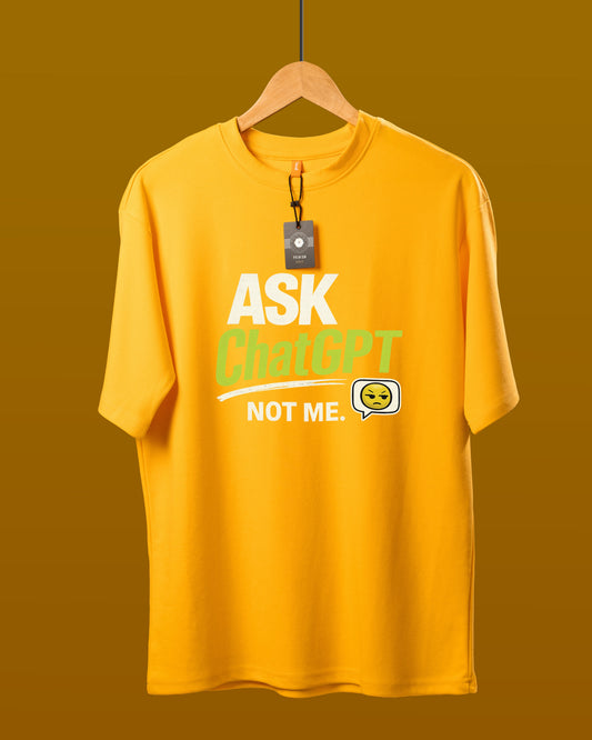 DUMM Ask ChatGPT Not Me oversized t-shirt in mustard yellow on wooden hanger