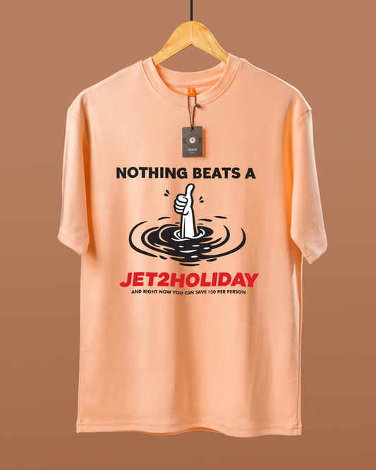 DUMM Nothing Beats A Holiday oversized t-shirt in peach on wooden hanger