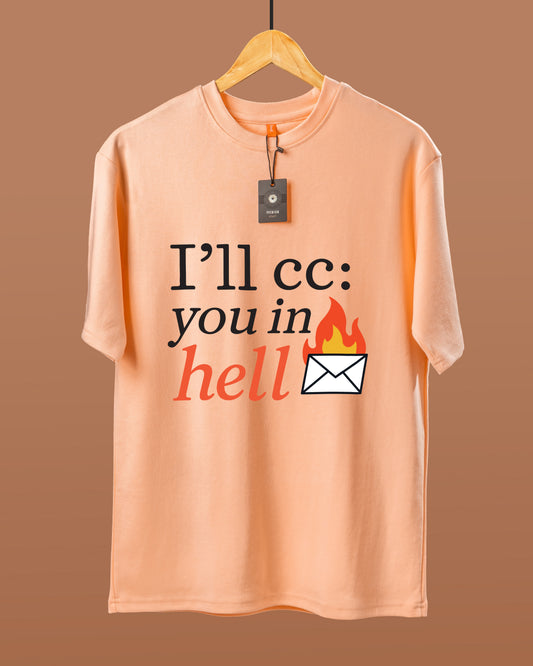 DUMM I'll CC You In Hell oversized t-shirt in peach on wooden hanger