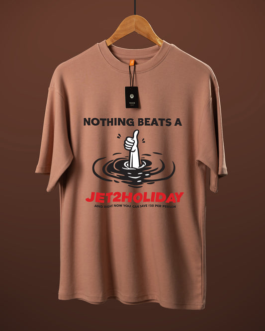 DUMM Nothing Beats A Holiday oversized t-shirt in dusty rose on wooden hanger