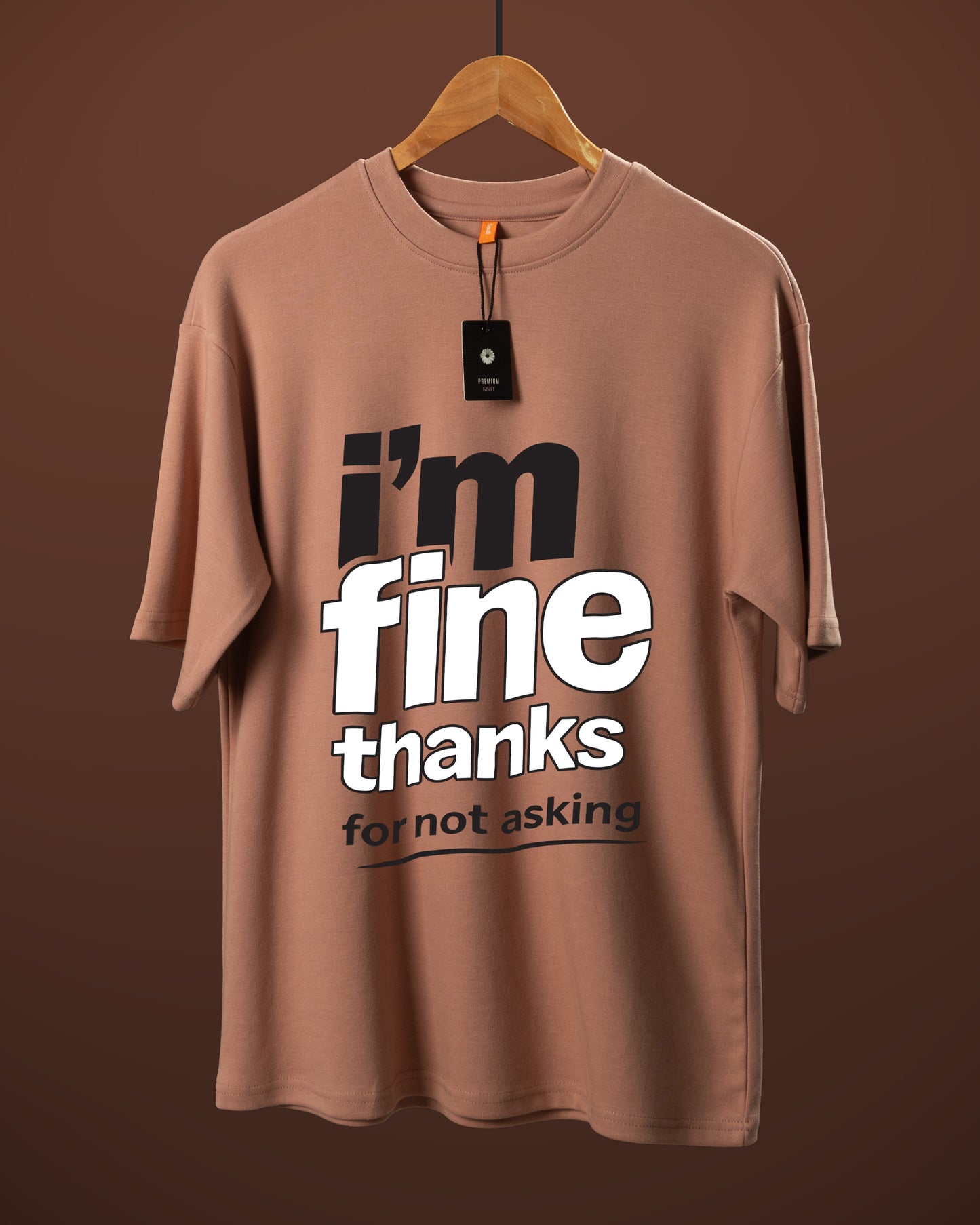 DUMM I'm Fine Thanks For Not Asking oversized t-shirt in dusty rose on wooden hanger