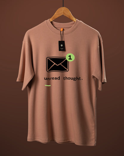 DUMM Unread Thought oversized t-shirt in dusty rose on wooden hanger