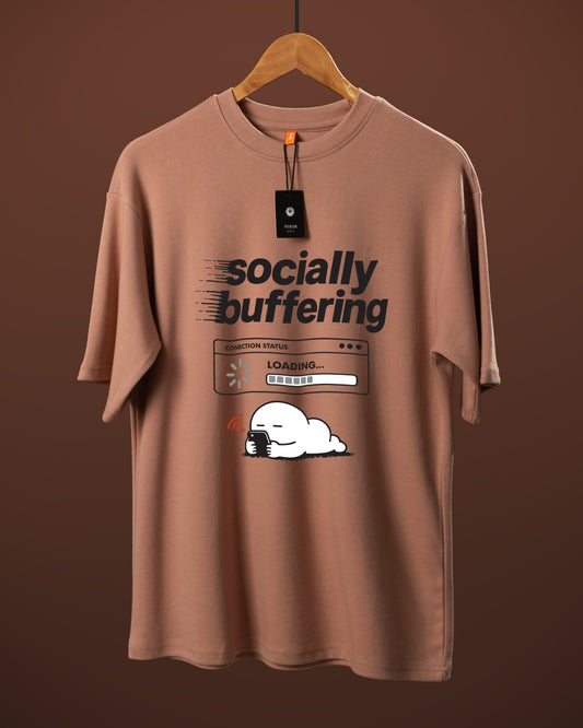 DUMM Socially Buffering oversized t-shirt in dusty rose on wooden hanger