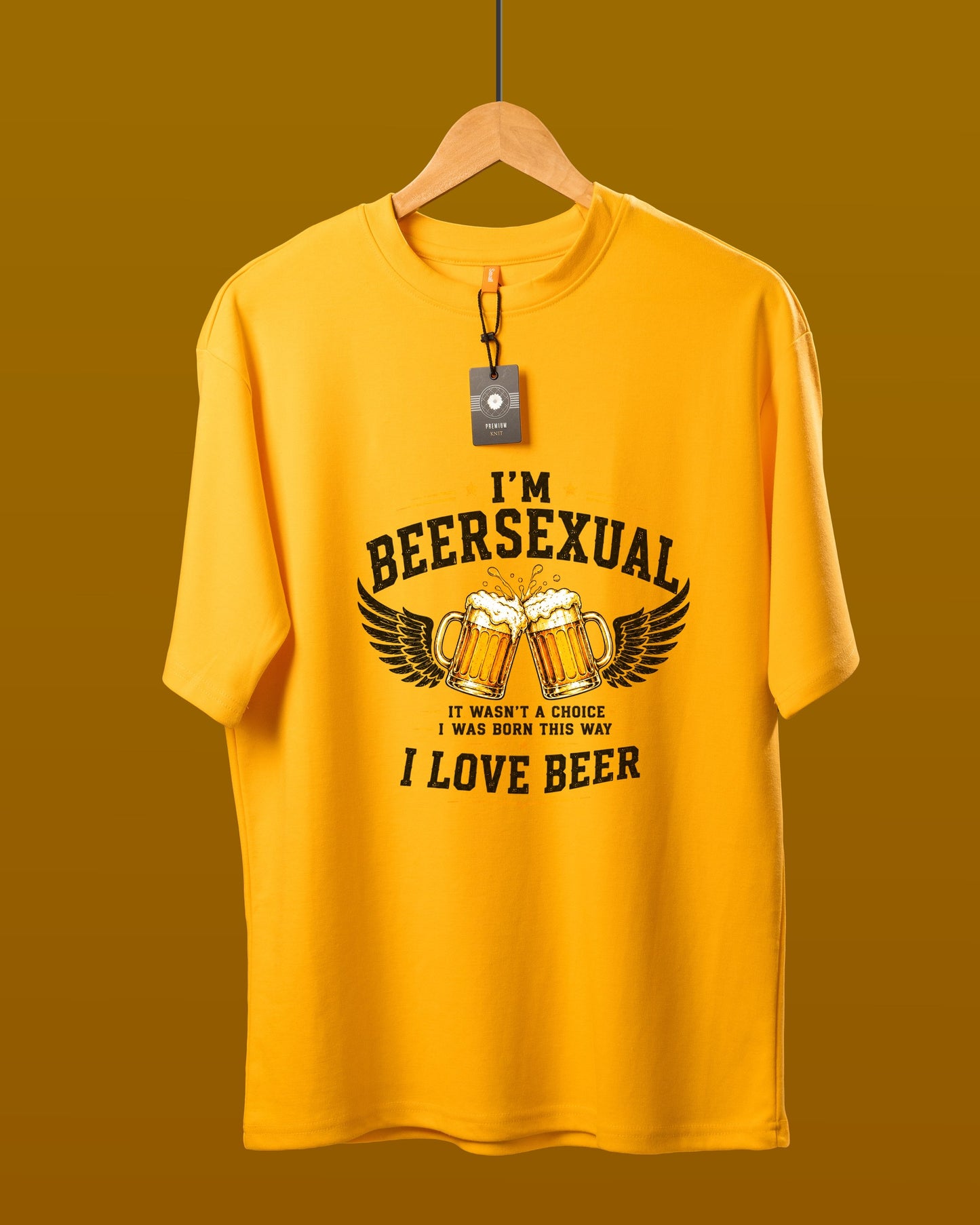 DUMM I'm Beersexual oversized t-shirt in mustard yellow on wooden hanger