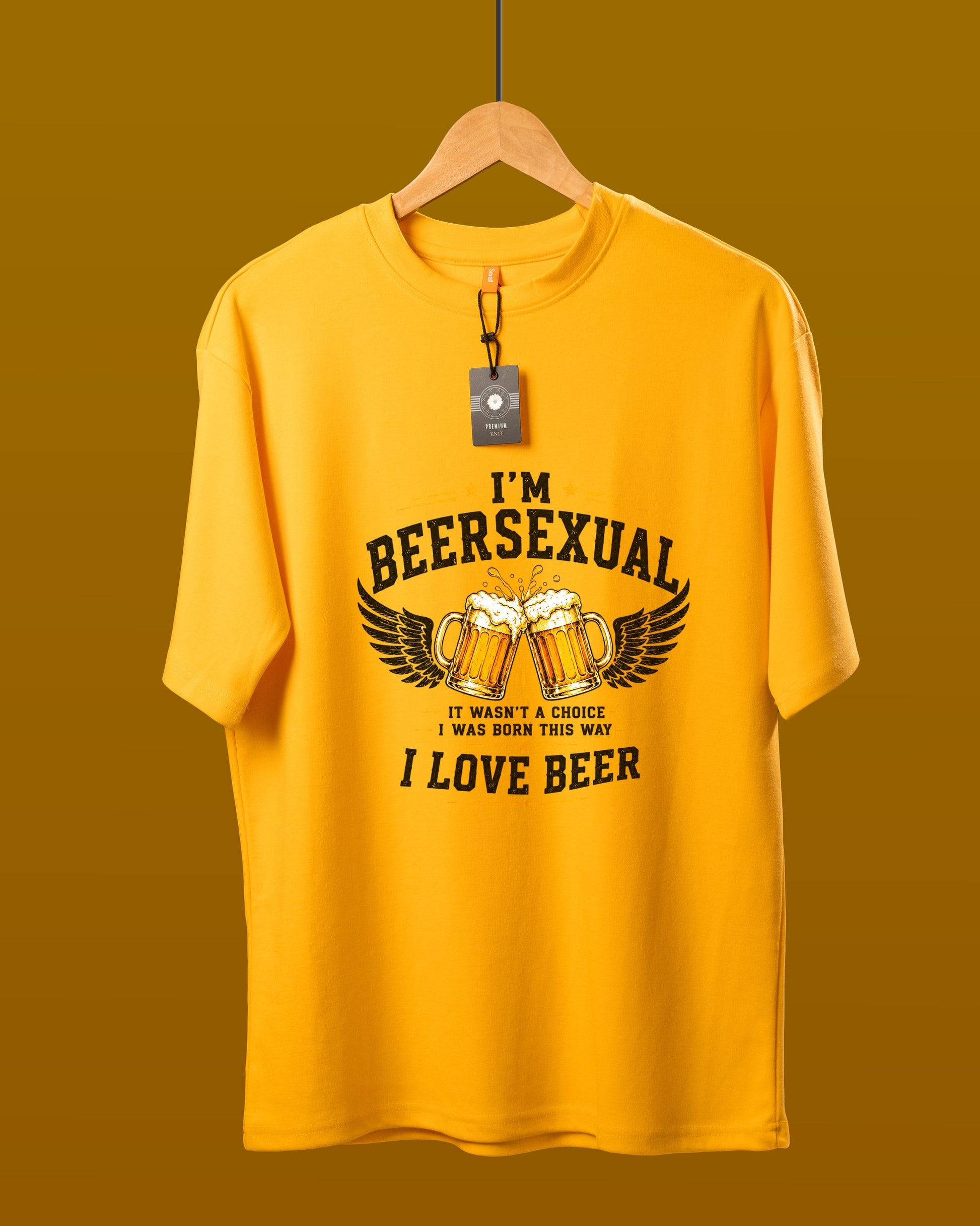 DUMM I'm Beersexual oversized t-shirt in mustard yellow on wooden hanger