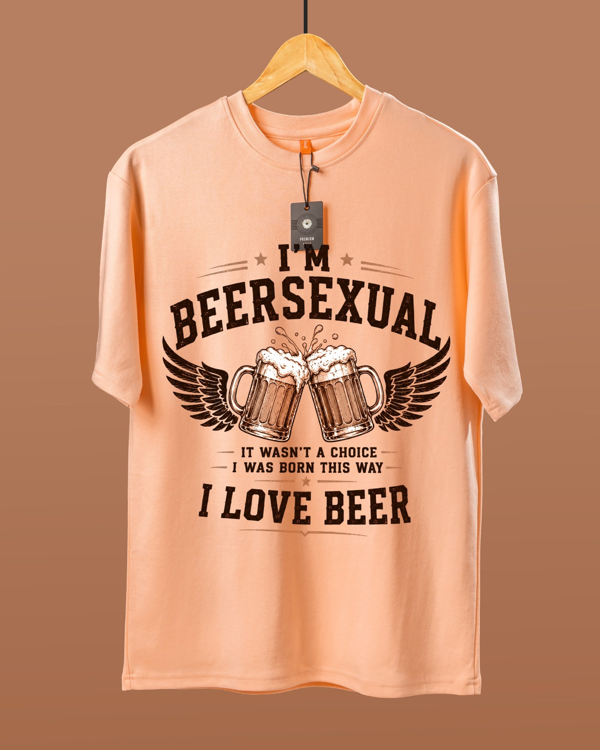 DUMM I'm Beersexual oversized t-shirt in peach on wooden hanger