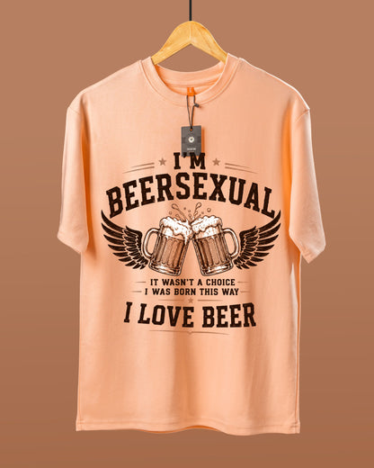DUMM I'm Beersexual oversized t-shirt in peach on wooden hanger