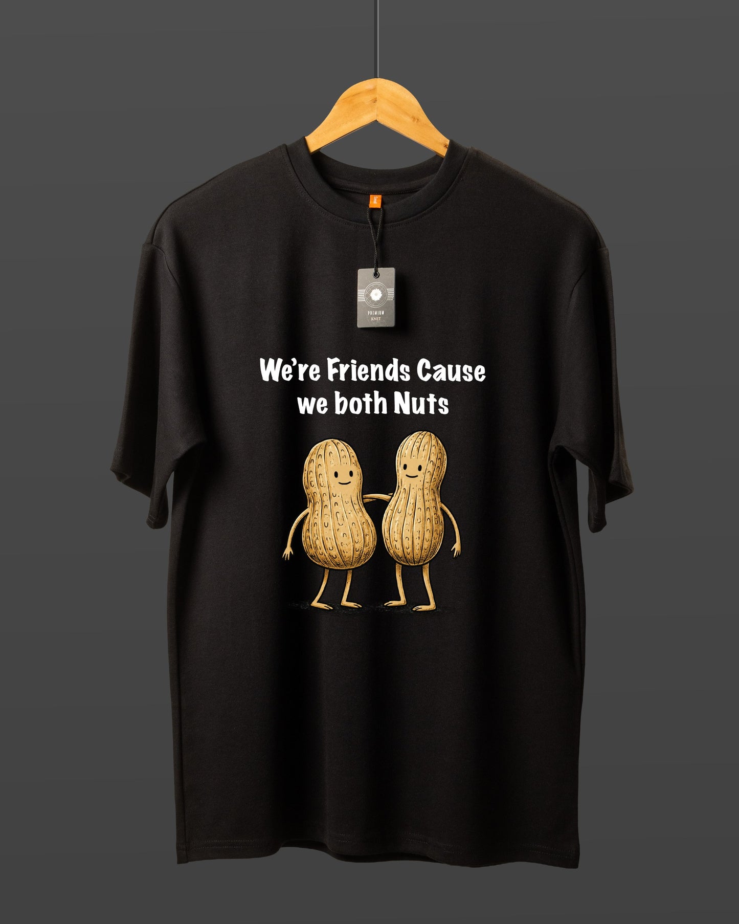 DUMM We're Friends Cause We Both Nuts oversized t-shirt in black on wooden hanger