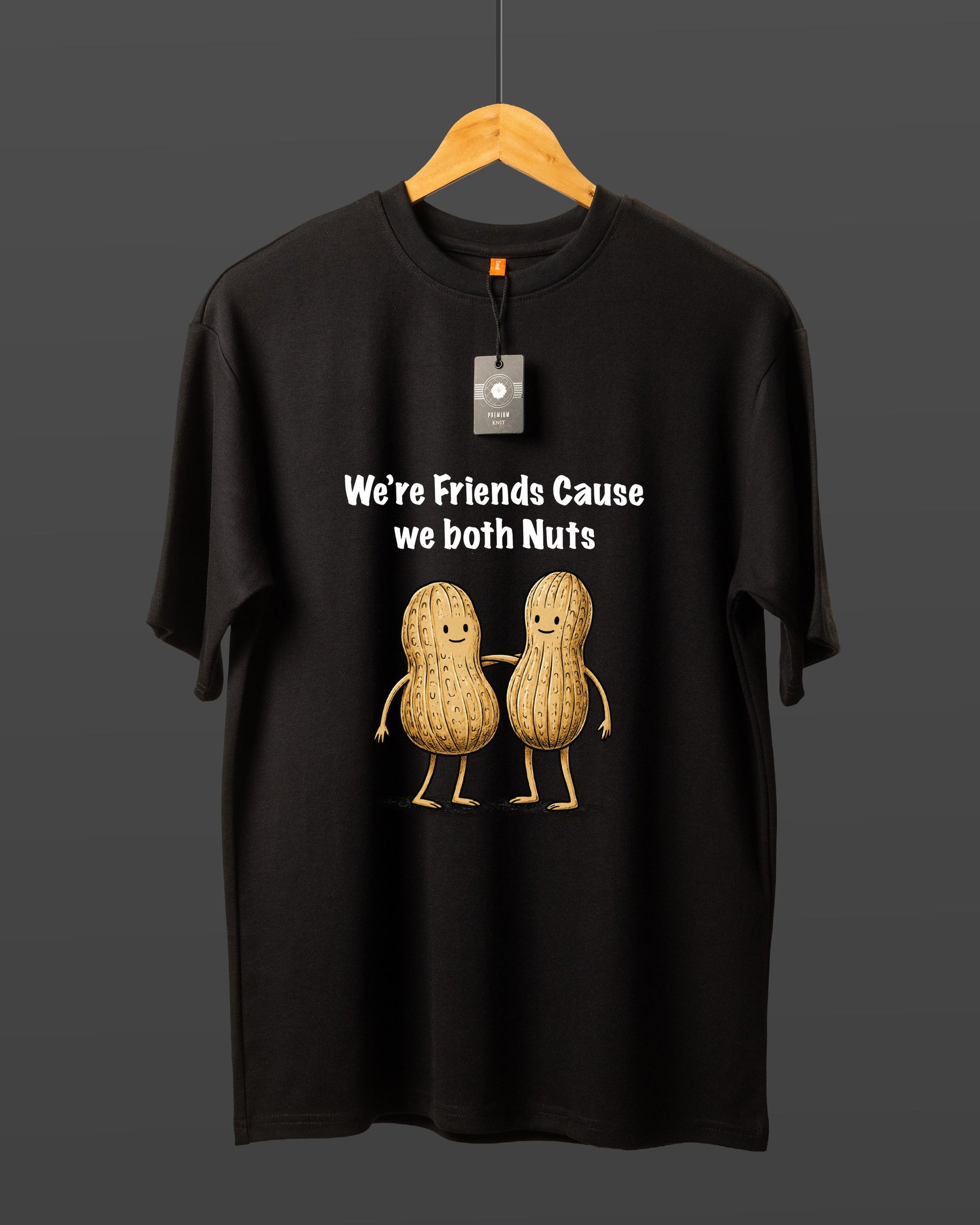 DUMM We're Friends Cause We Both Nuts oversized t-shirt in black on wooden hanger