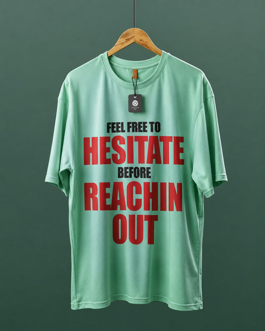 DUMM Feel Free To Hesitate Before Reachin Out oversized t-shirt in mint green on wooden hanger