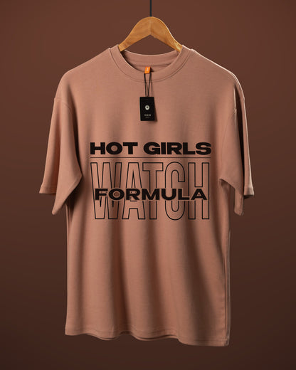DUMM Hot Girls Watch Formula oversized t-shirt in dusty rose on wooden hanger