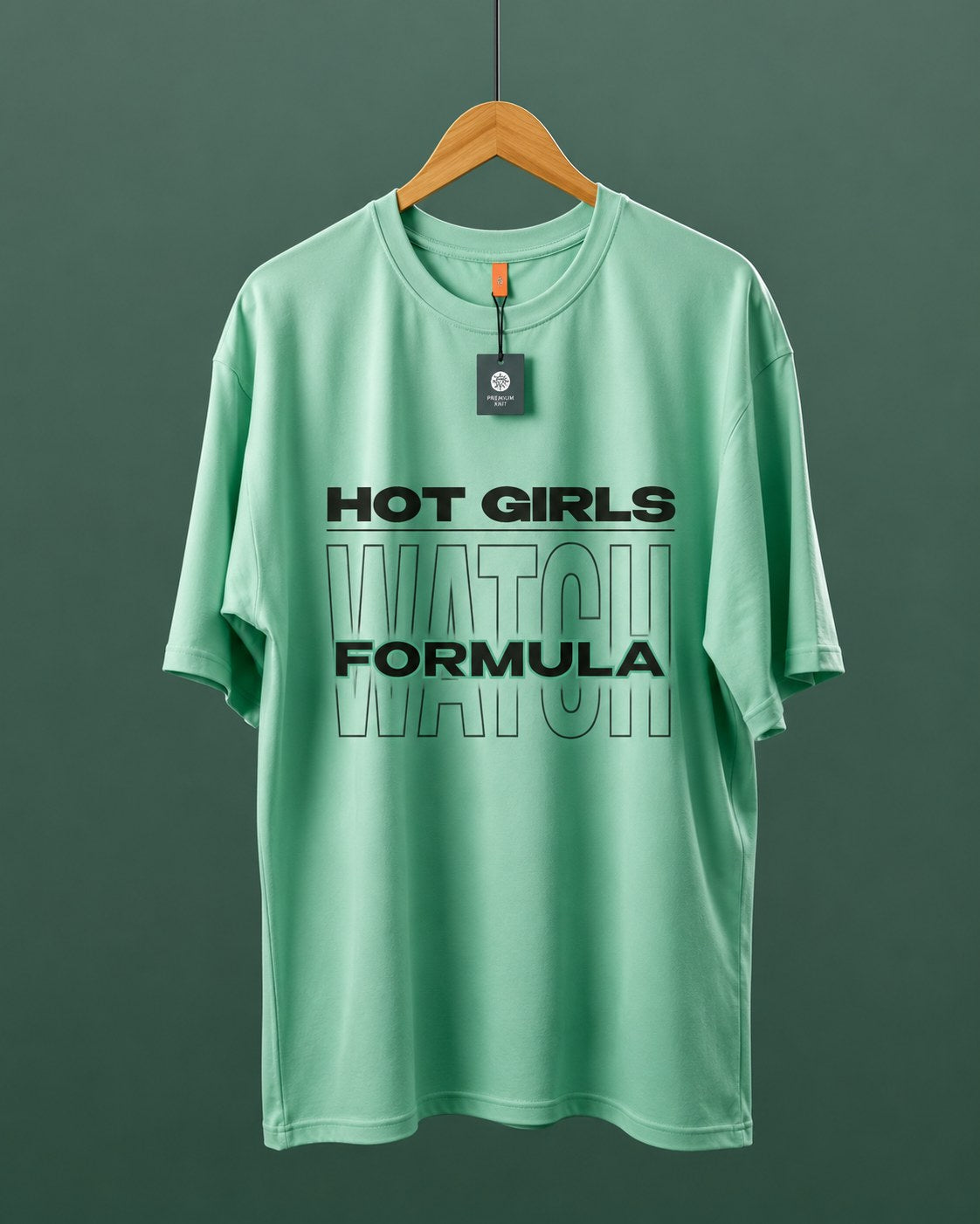 DUMM Hot Girls Watch Formula oversized t-shirt in mint green on wooden hanger