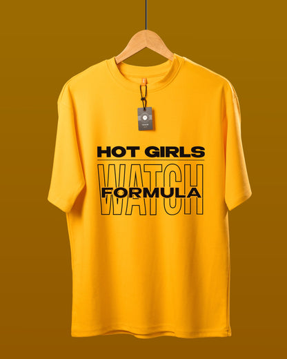 DUMM Hot Girls Watch Formula oversized t-shirt in mustard yellow on wooden hanger