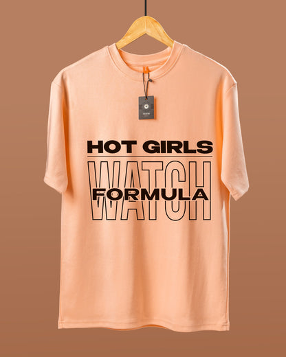 DUMM Hot Girls Watch Formula oversized t-shirt in peach on wooden hanger