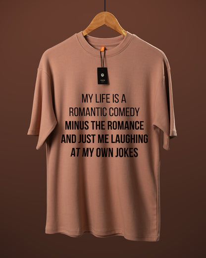 DUMM Romantic Comedy Minus The Romance oversized t-shirt in dusty rose on wooden hanger